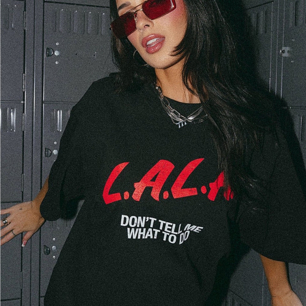 Dressed in Lala tee shirt